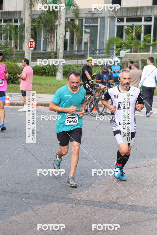 Buy your photos of the eventMeia Maratona Internacional de Curitiba 2018 on Fotop