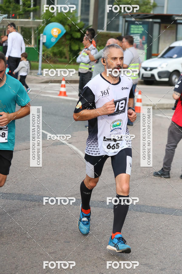 Buy your photos of the eventMeia Maratona Internacional de Curitiba 2018 on Fotop