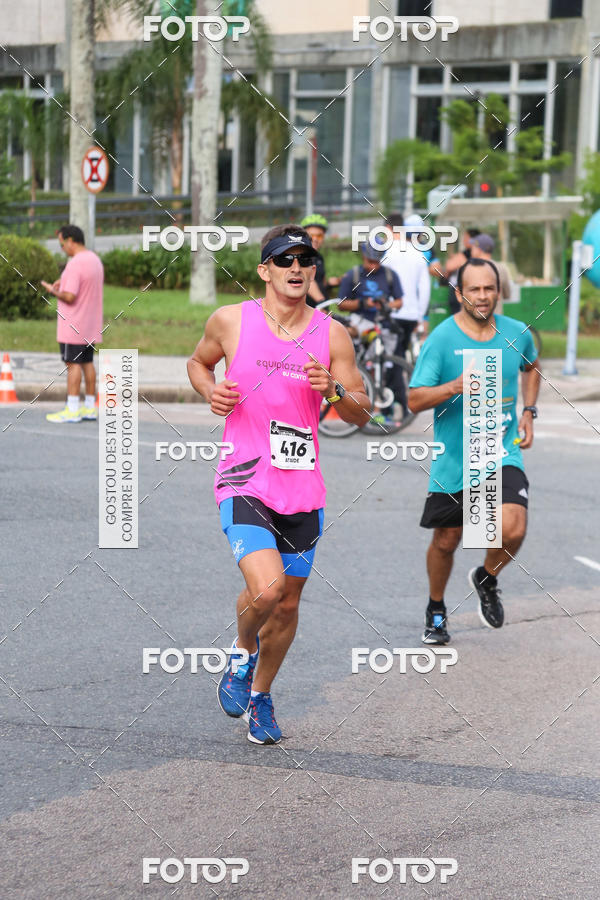 Buy your photos of the eventMeia Maratona Internacional de Curitiba 2018 on Fotop
