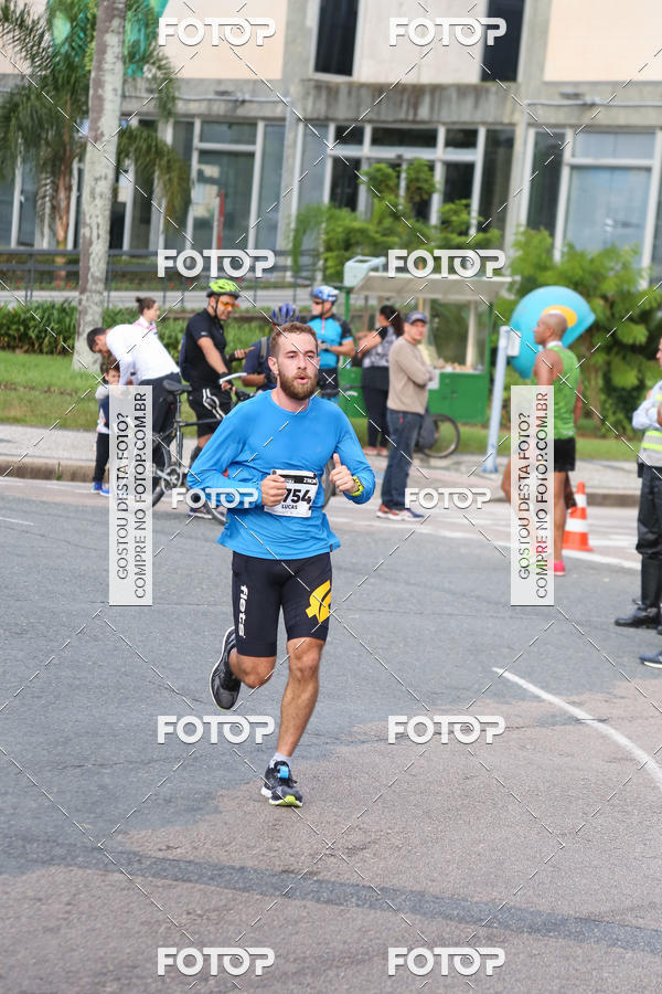 Buy your photos of the eventMeia Maratona Internacional de Curitiba 2018 on Fotop