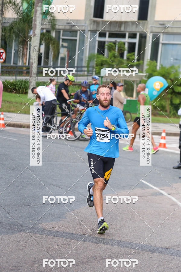 Buy your photos of the eventMeia Maratona Internacional de Curitiba 2018 on Fotop