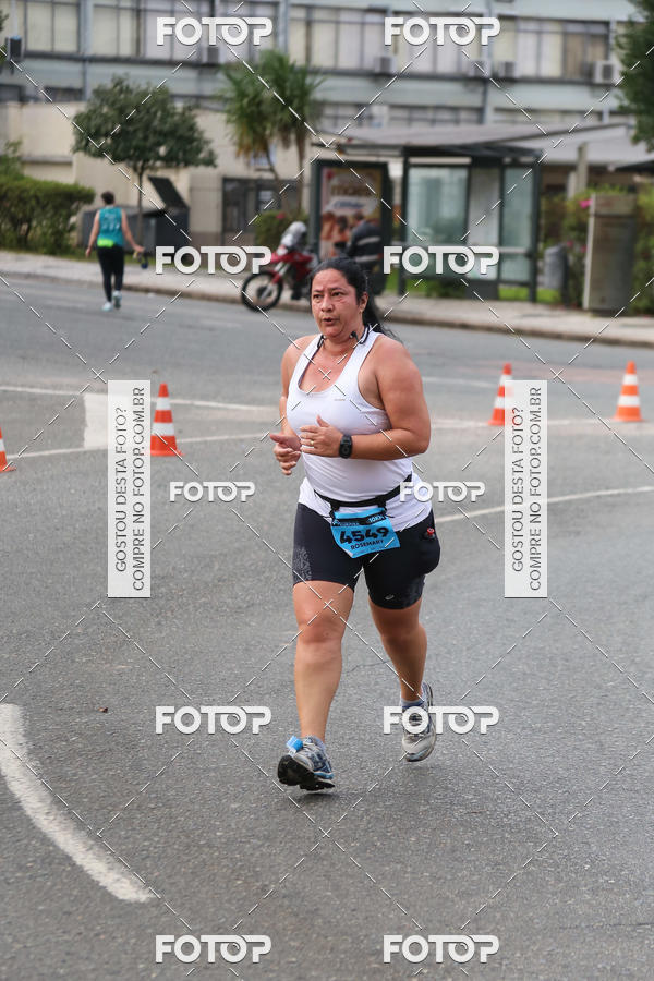 Buy your photos of the eventMeia Maratona Internacional de Curitiba 2018 on Fotop