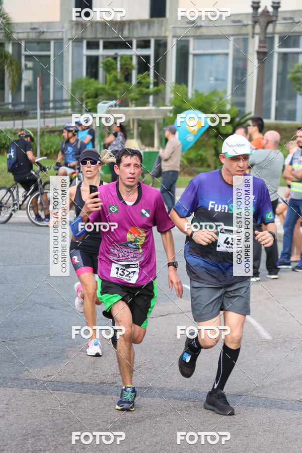 Buy your photos of the eventMeia Maratona Internacional de Curitiba 2018 on Fotop