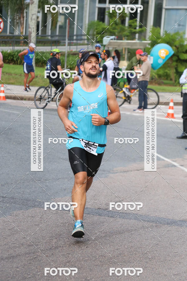 Buy your photos of the eventMeia Maratona Internacional de Curitiba 2018 on Fotop