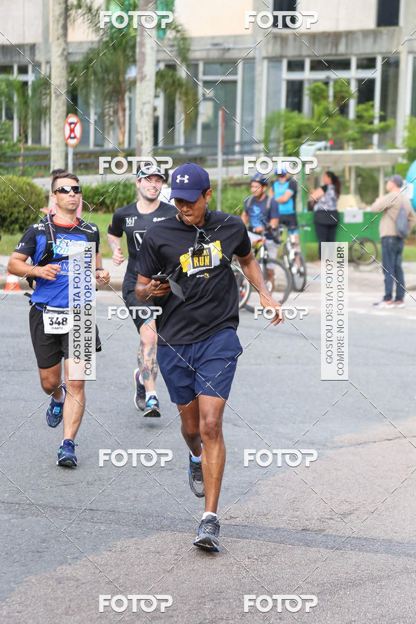 Buy your photos of the eventMeia Maratona Internacional de Curitiba 2018 on Fotop