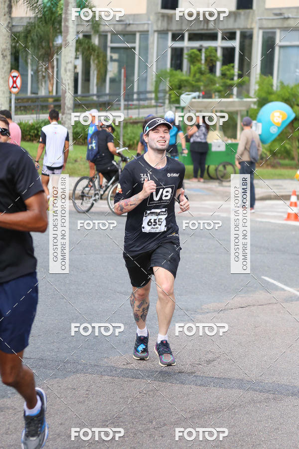 Buy your photos of the eventMeia Maratona Internacional de Curitiba 2018 on Fotop