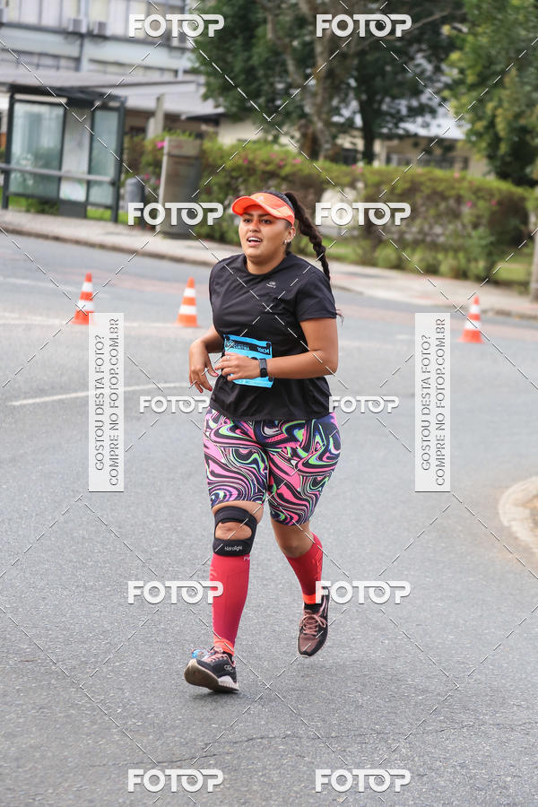 Buy your photos of the eventMeia Maratona Internacional de Curitiba 2018 on Fotop