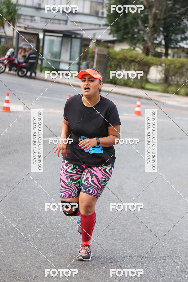 Buy your photos of the eventMeia Maratona Internacional de Curitiba 2018 on Fotop
