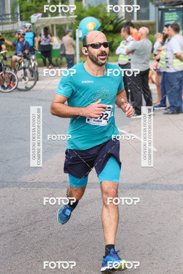 Buy your photos of the eventMeia Maratona Internacional de Curitiba 2018 on Fotop