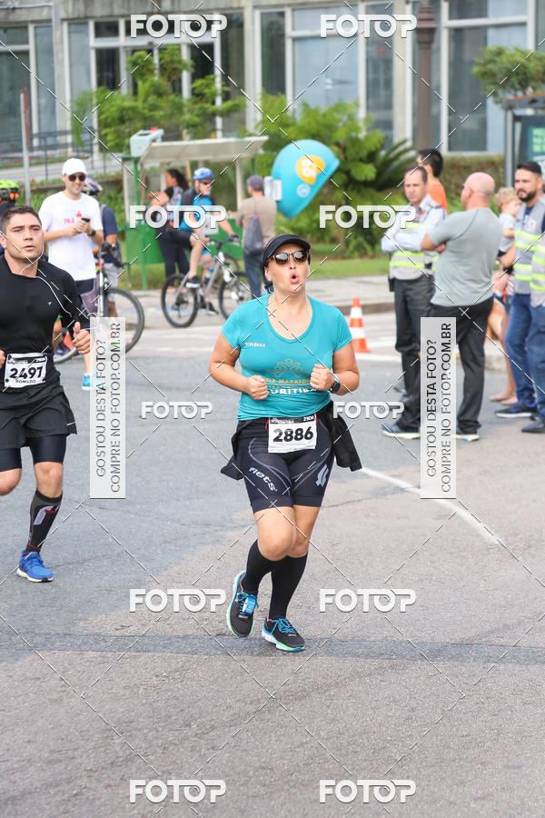 Buy your photos of the eventMeia Maratona Internacional de Curitiba 2018 on Fotop