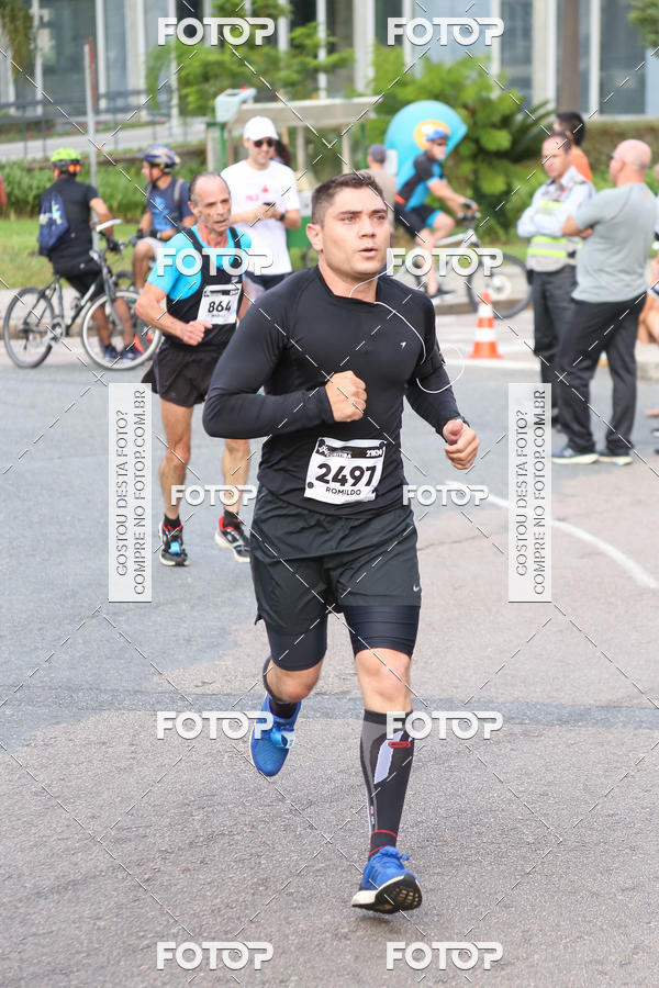 Buy your photos of the eventMeia Maratona Internacional de Curitiba 2018 on Fotop