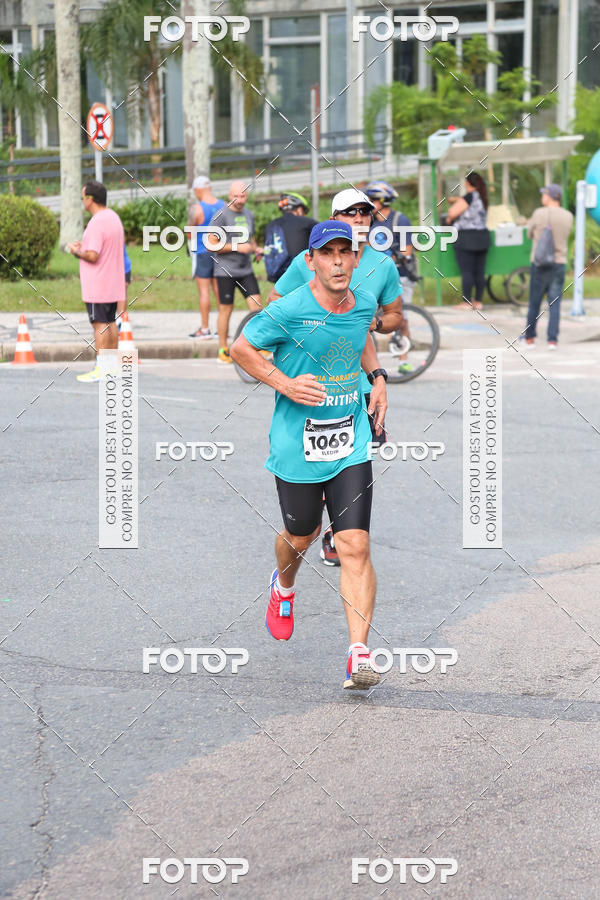 Buy your photos of the eventMeia Maratona Internacional de Curitiba 2018 on Fotop