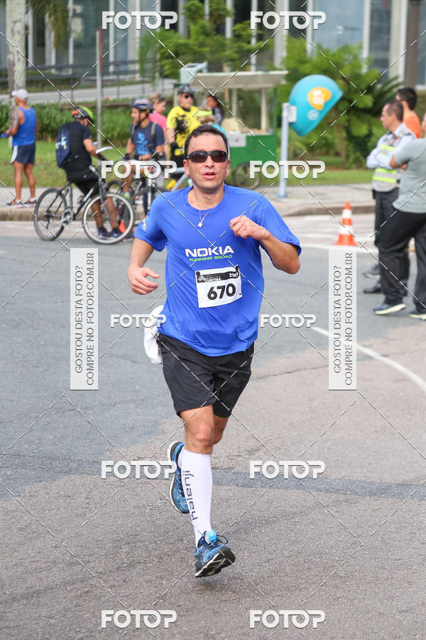 Buy your photos of the eventMeia Maratona Internacional de Curitiba 2018 on Fotop