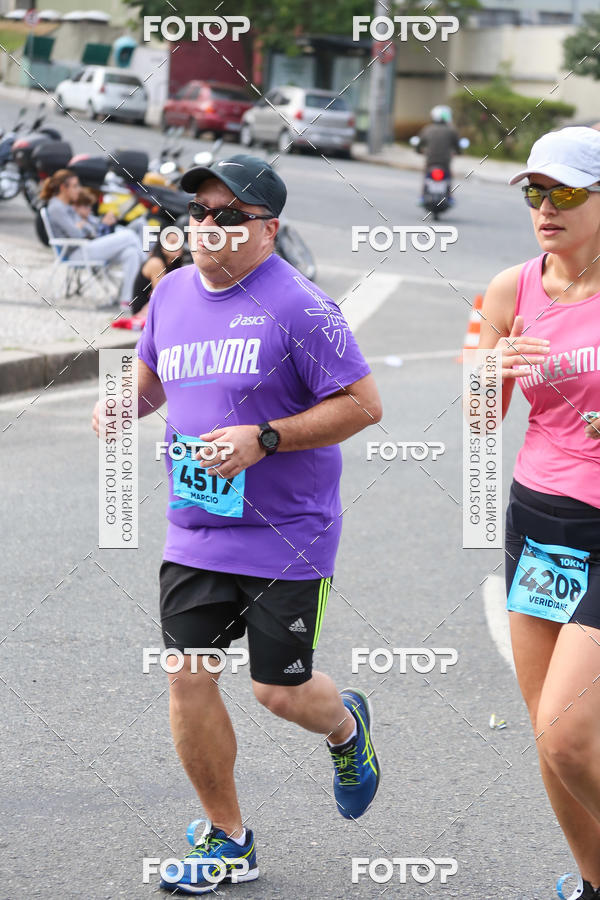 Buy your photos of the eventMeia Maratona Internacional de Curitiba 2018 on Fotop