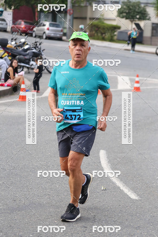 Buy your photos of the eventMeia Maratona Internacional de Curitiba 2018 on Fotop