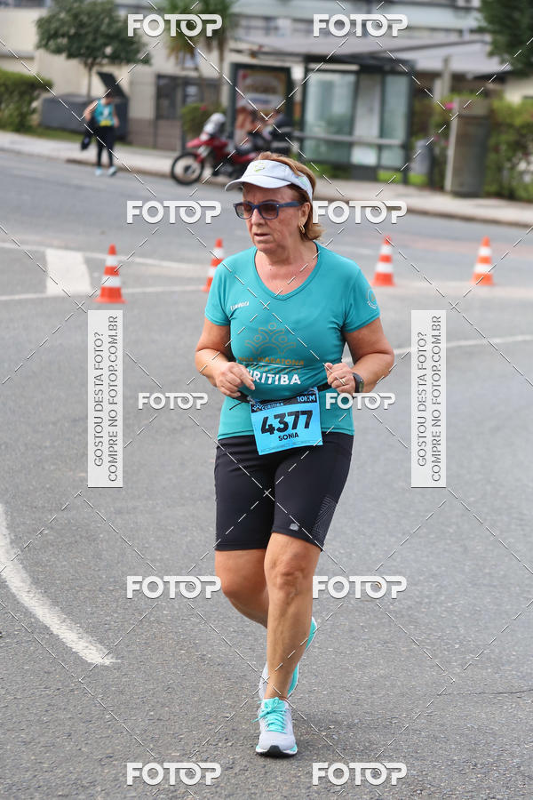 Buy your photos of the eventMeia Maratona Internacional de Curitiba 2018 on Fotop