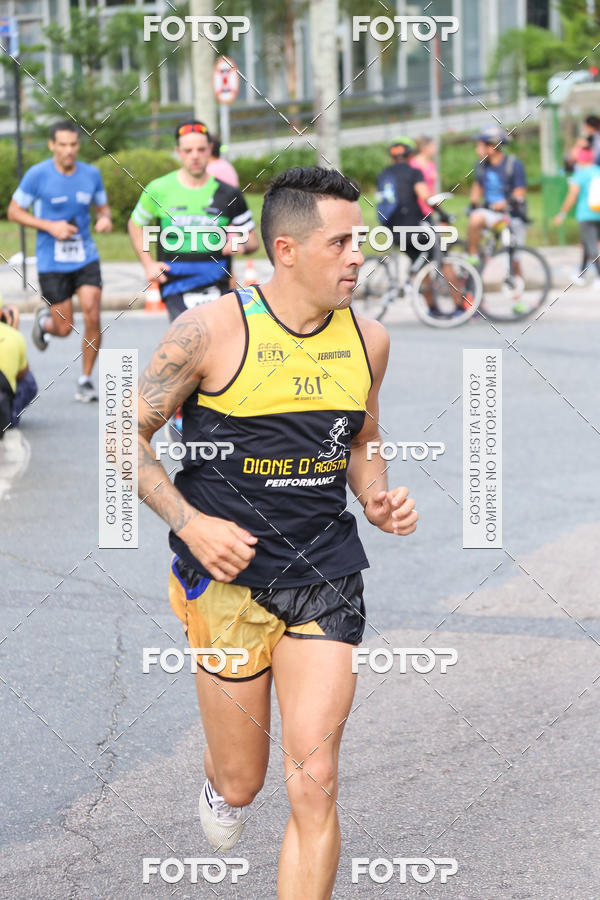 Buy your photos of the eventMeia Maratona Internacional de Curitiba 2018 on Fotop