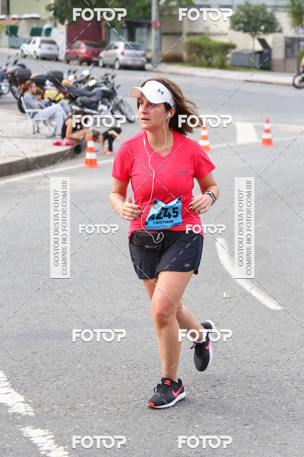 Buy your photos of the eventMeia Maratona Internacional de Curitiba 2018 on Fotop