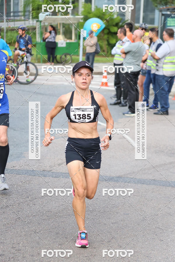 Buy your photos of the eventMeia Maratona Internacional de Curitiba 2018 on Fotop