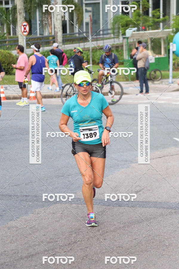 Buy your photos of the eventMeia Maratona Internacional de Curitiba 2018 on Fotop