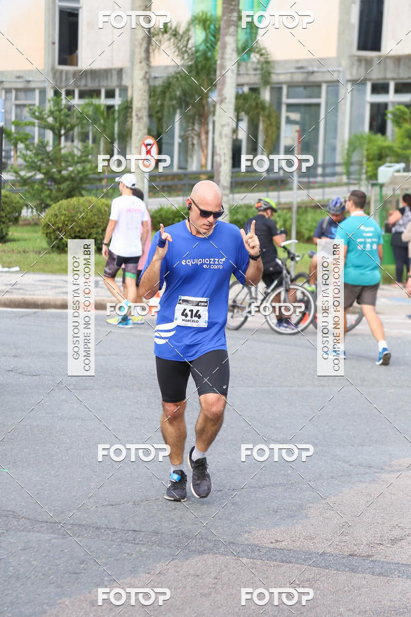 Buy your photos of the eventMeia Maratona Internacional de Curitiba 2018 on Fotop