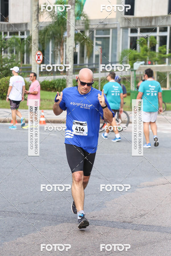 Buy your photos of the eventMeia Maratona Internacional de Curitiba 2018 on Fotop