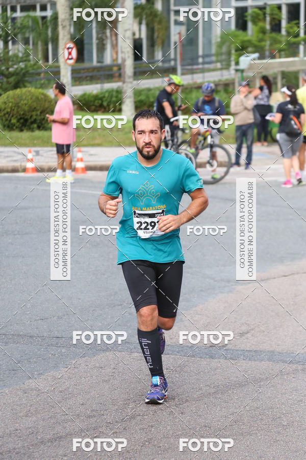 Buy your photos of the eventMeia Maratona Internacional de Curitiba 2018 on Fotop