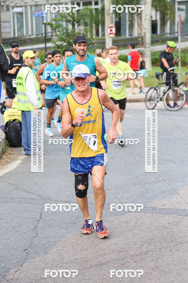 Buy your photos of the eventMeia Maratona Internacional de Curitiba 2018 on Fotop