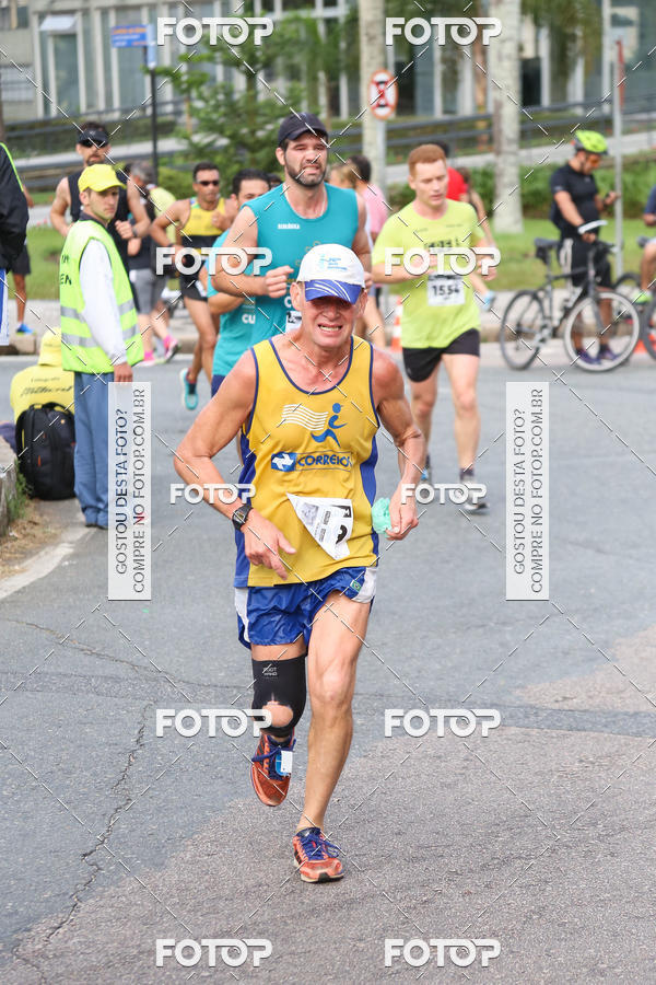 Buy your photos of the eventMeia Maratona Internacional de Curitiba 2018 on Fotop