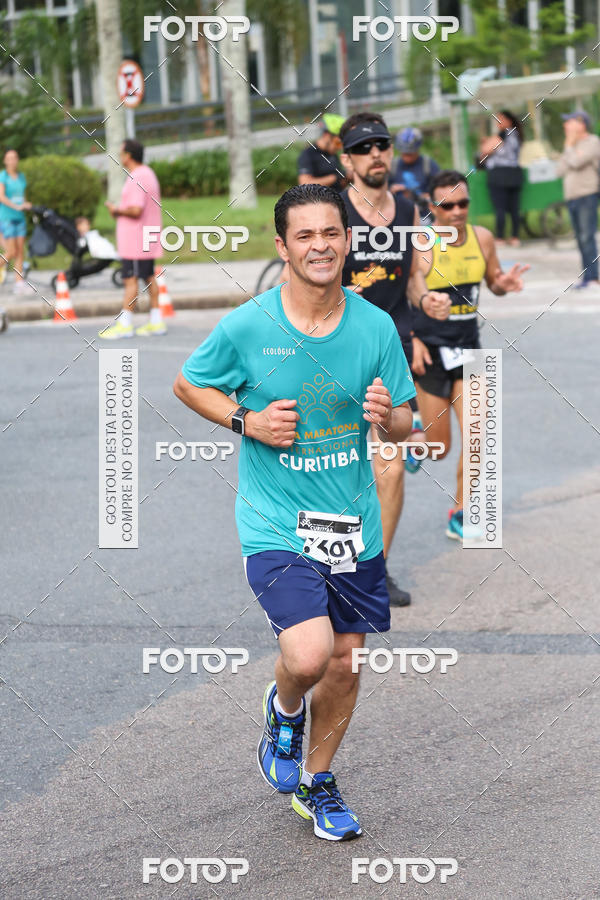 Buy your photos of the eventMeia Maratona Internacional de Curitiba 2018 on Fotop
