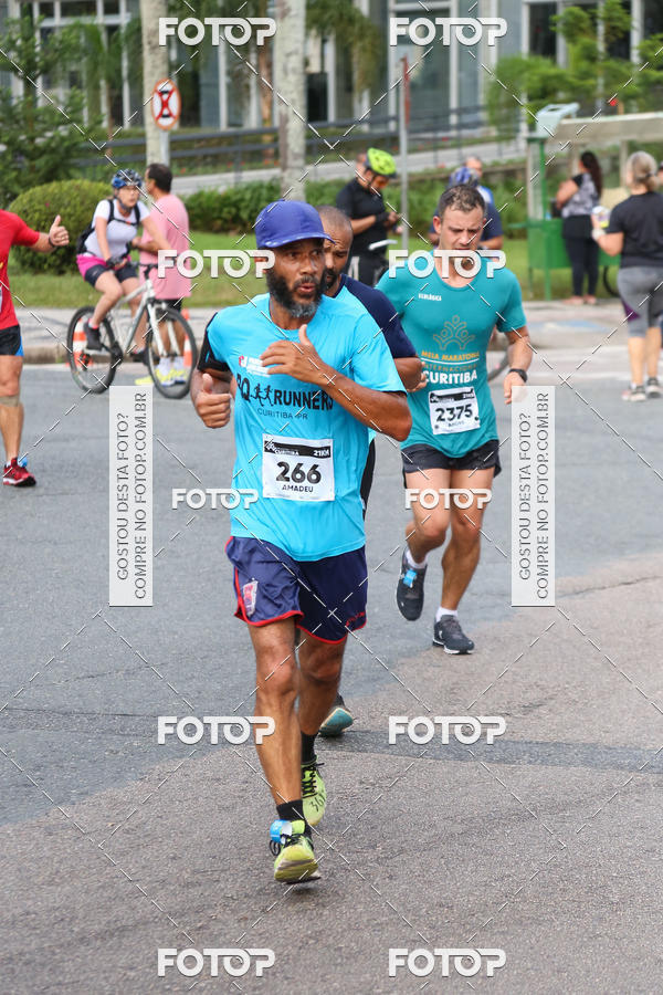 Buy your photos of the eventMeia Maratona Internacional de Curitiba 2018 on Fotop