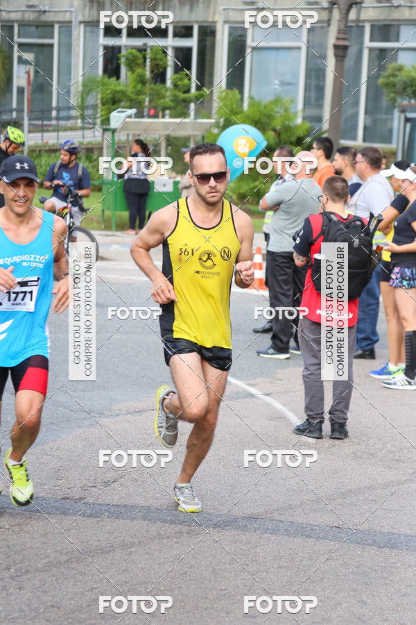 Buy your photos of the eventMeia Maratona Internacional de Curitiba 2018 on Fotop