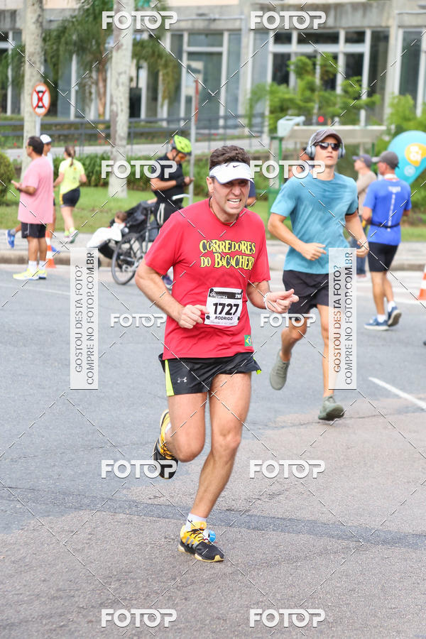 Buy your photos of the eventMeia Maratona Internacional de Curitiba 2018 on Fotop