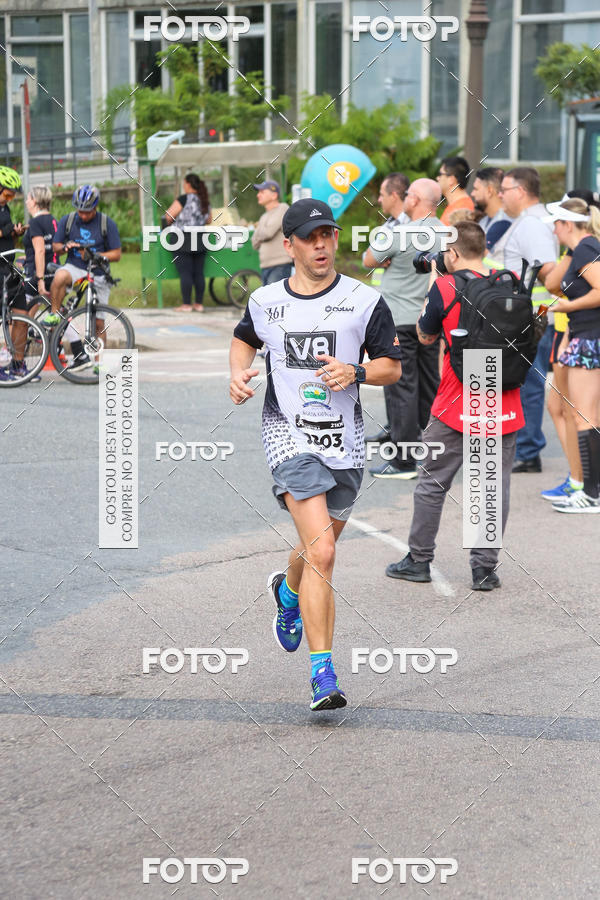Buy your photos of the eventMeia Maratona Internacional de Curitiba 2018 on Fotop