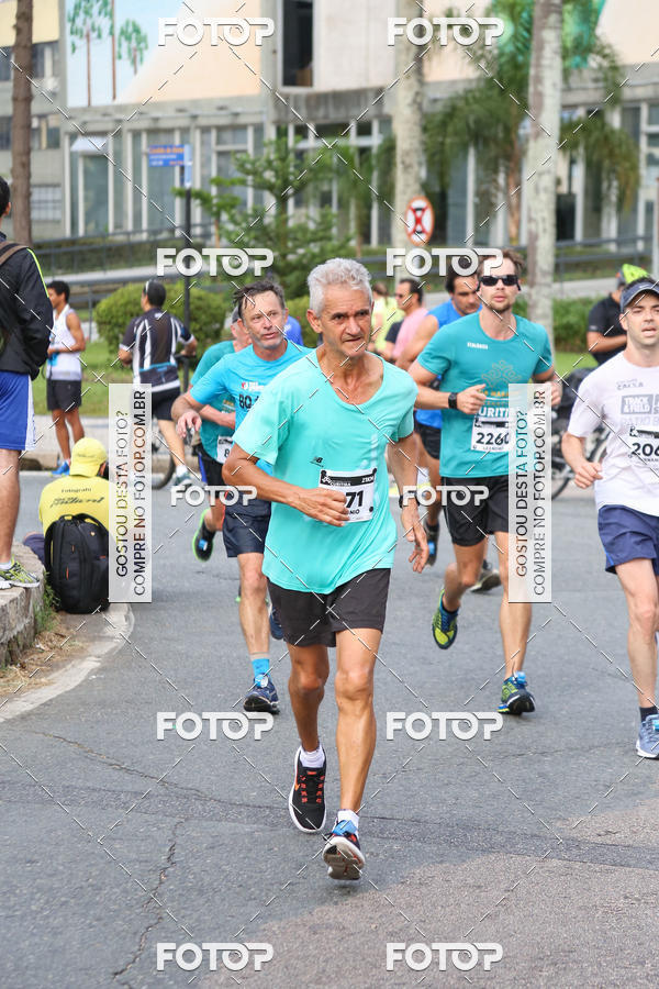 Buy your photos of the eventMeia Maratona Internacional de Curitiba 2018 on Fotop