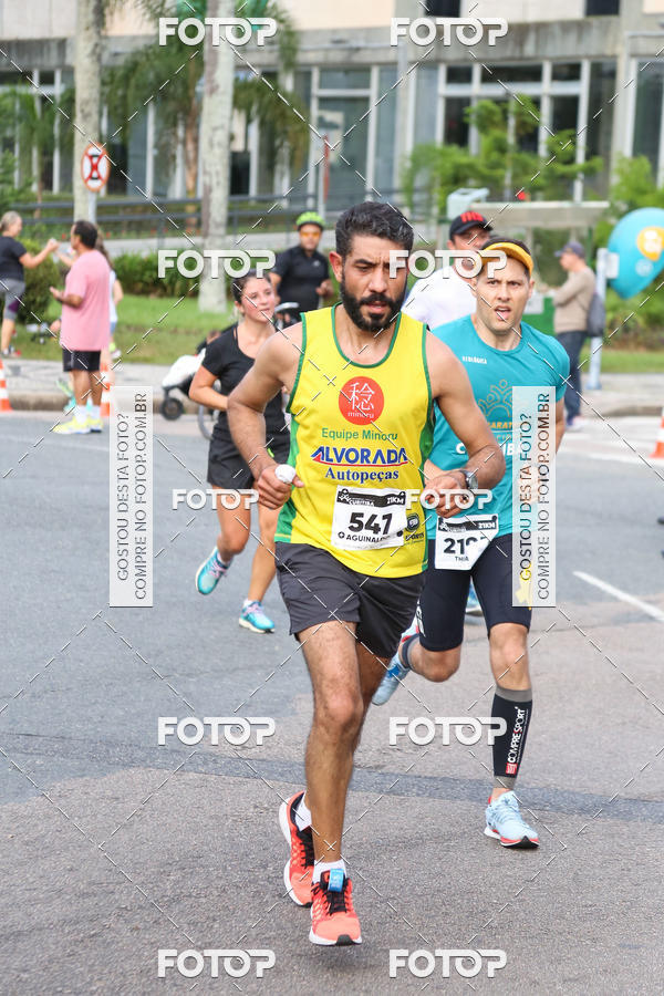 Buy your photos of the eventMeia Maratona Internacional de Curitiba 2018 on Fotop