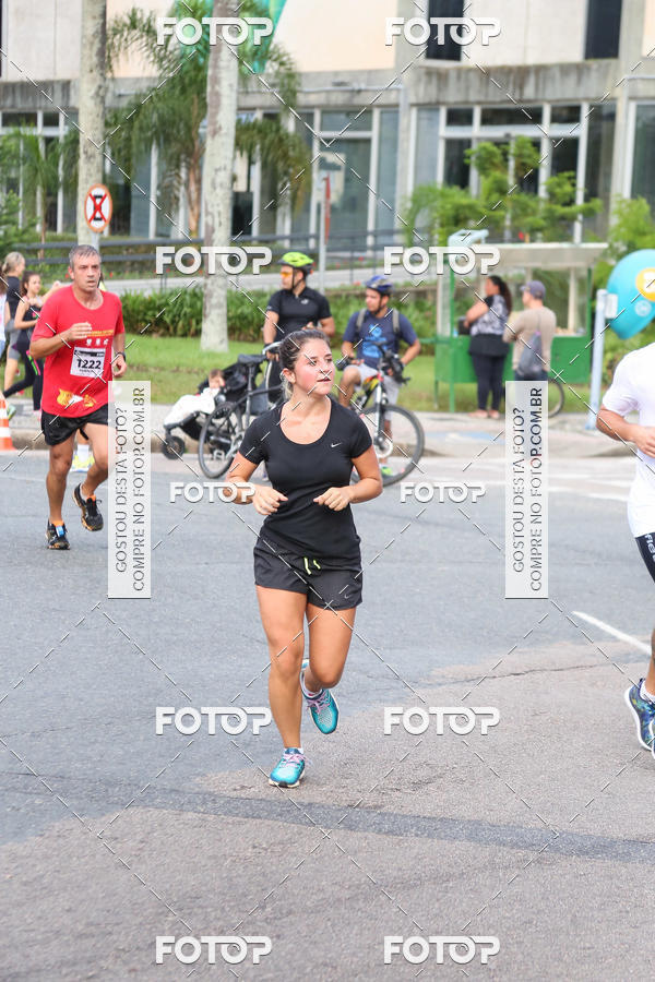 Buy your photos of the eventMeia Maratona Internacional de Curitiba 2018 on Fotop
