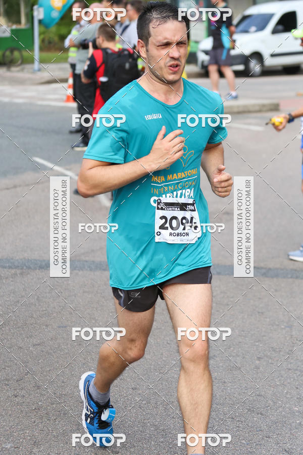 Buy your photos of the eventMeia Maratona Internacional de Curitiba 2018 on Fotop