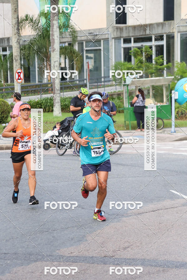 Buy your photos of the eventMeia Maratona Internacional de Curitiba 2018 on Fotop