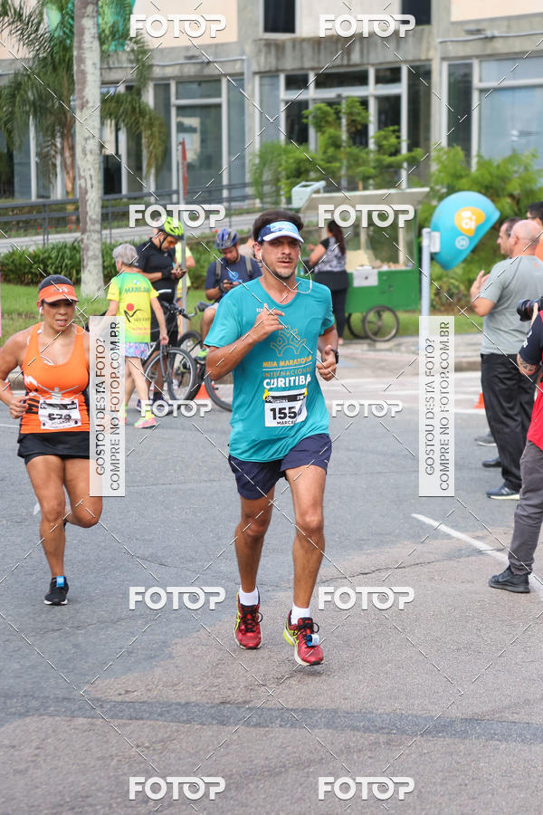 Buy your photos of the eventMeia Maratona Internacional de Curitiba 2018 on Fotop