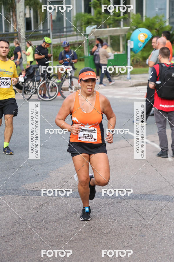 Buy your photos of the eventMeia Maratona Internacional de Curitiba 2018 on Fotop