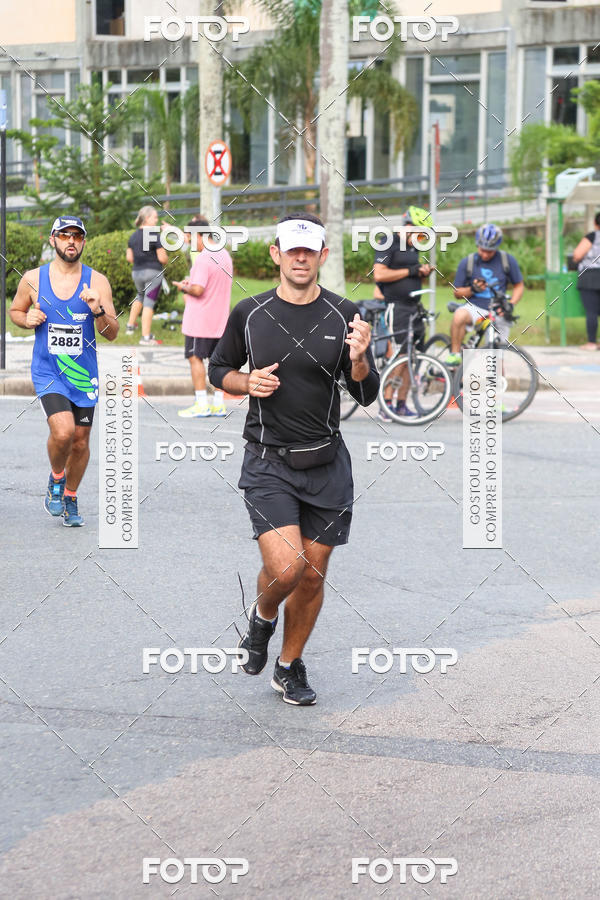 Buy your photos of the eventMeia Maratona Internacional de Curitiba 2018 on Fotop