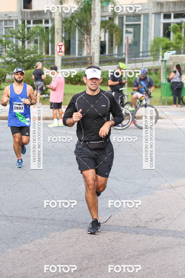 Buy your photos of the eventMeia Maratona Internacional de Curitiba 2018 on Fotop