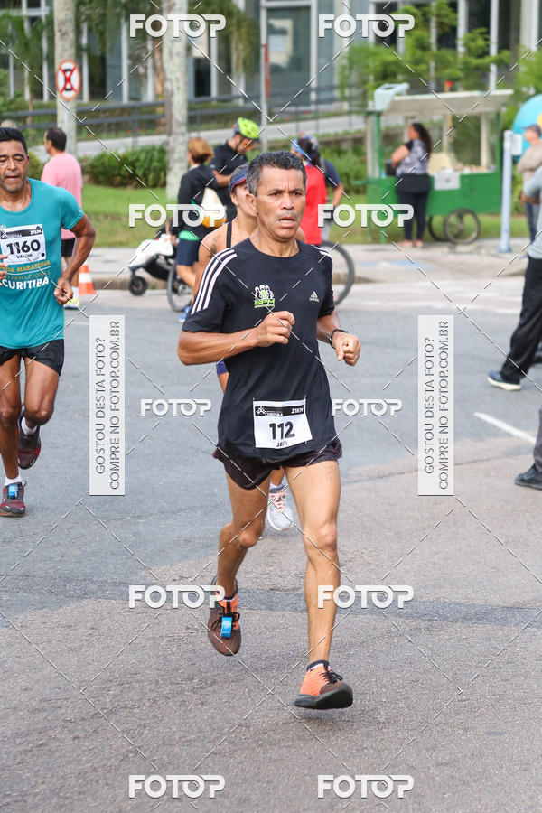 Buy your photos of the eventMeia Maratona Internacional de Curitiba 2018 on Fotop