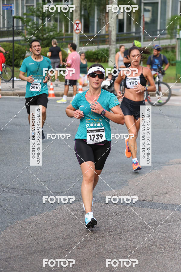 Buy your photos of the eventMeia Maratona Internacional de Curitiba 2018 on Fotop