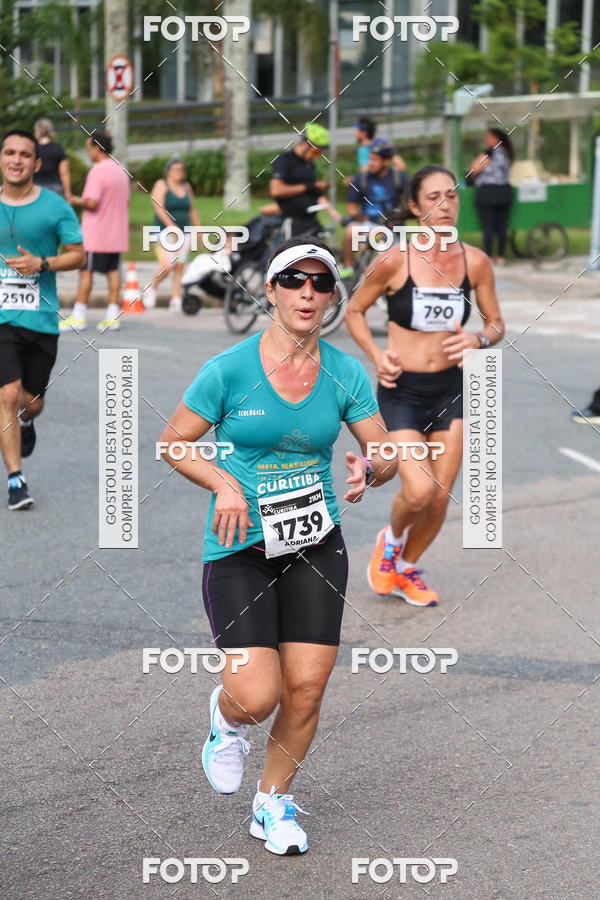 Buy your photos of the eventMeia Maratona Internacional de Curitiba 2018 on Fotop