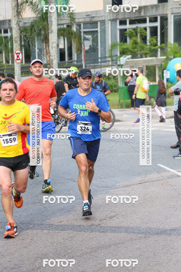 Buy your photos of the eventMeia Maratona Internacional de Curitiba 2018 on Fotop