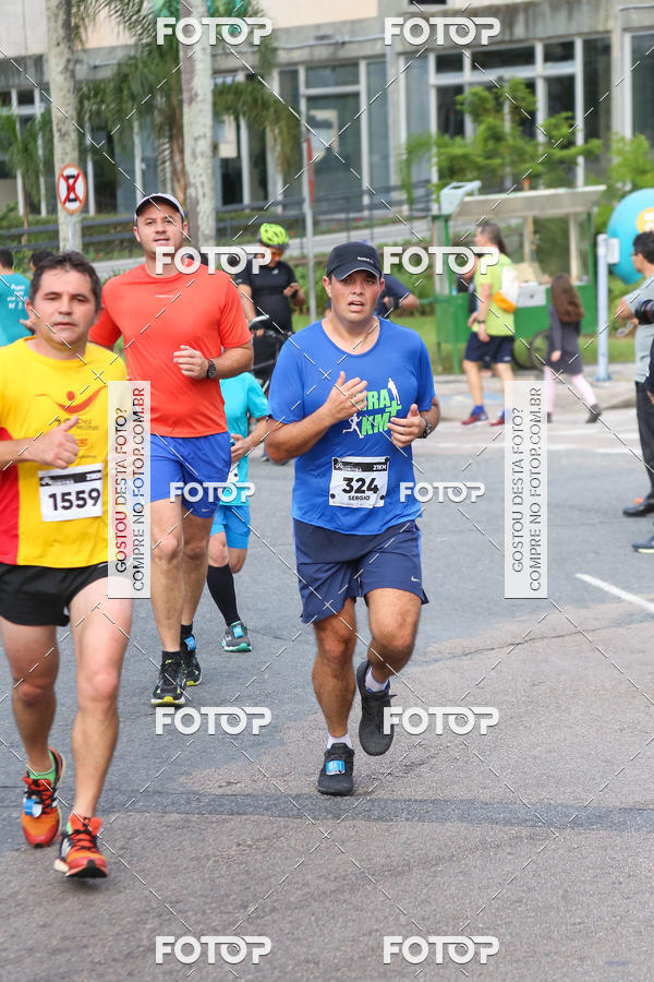 Buy your photos of the eventMeia Maratona Internacional de Curitiba 2018 on Fotop