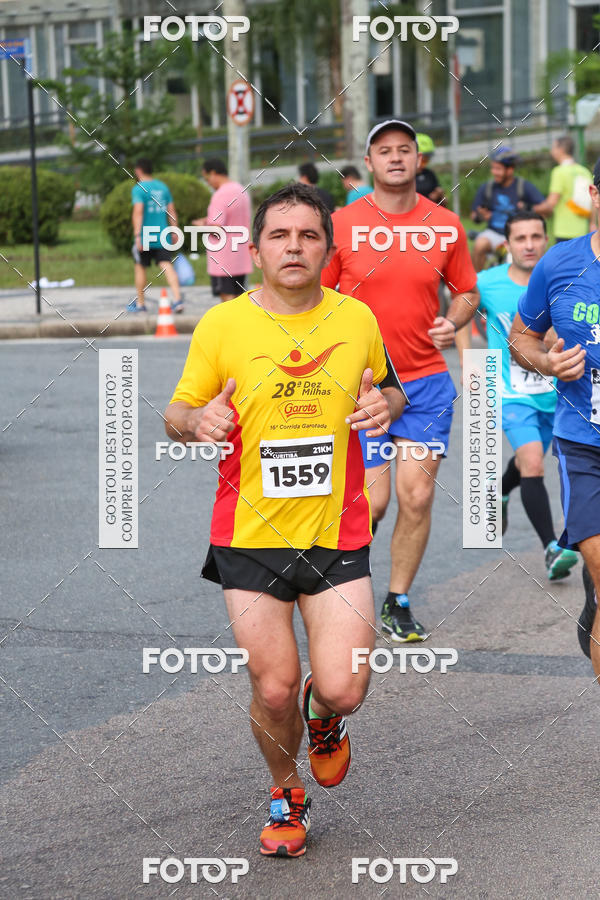 Buy your photos of the eventMeia Maratona Internacional de Curitiba 2018 on Fotop