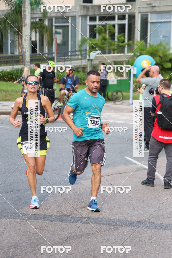 Buy your photos of the eventMeia Maratona Internacional de Curitiba 2018 on Fotop